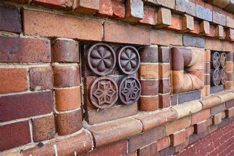 Fragment of old brick walls with patterns | Stock Photo | Colourbox