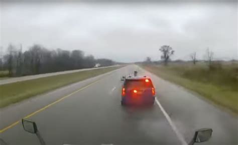 Dash cam video shows semi truck striking Michigan trooper's vehicle on I-94