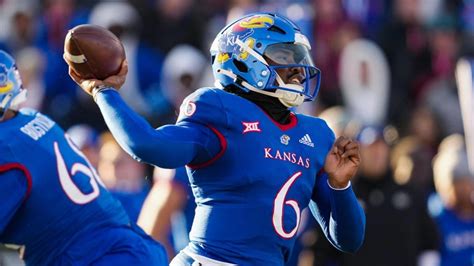 LOOK: Kansas QB Jalon Daniels sports necklace playing his highlights at 2023 Big 12 Media Days ...