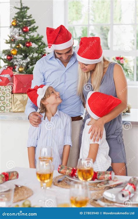 Happy family at christmas stock photo. Image of family - 27803940