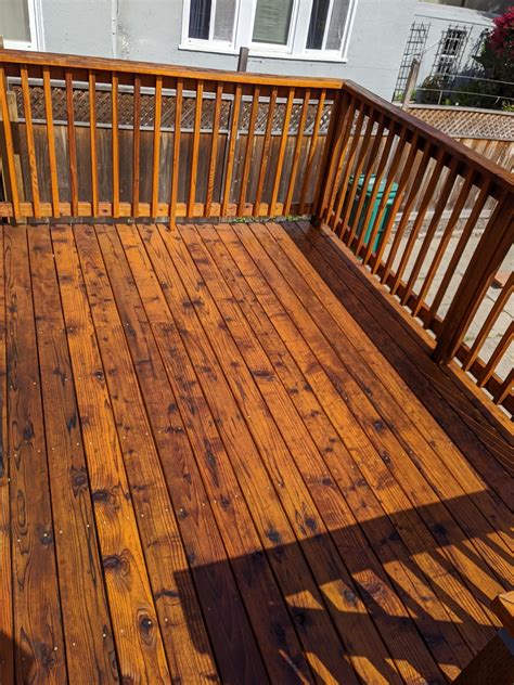 Redwood deck restaining. Before and after pics. : r/Decks