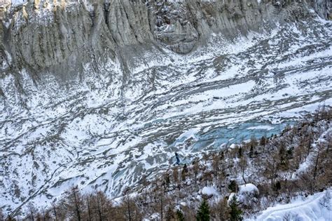 Visiters Enterning Ice Cave Under Massive Glacier Near Chamonix in ...