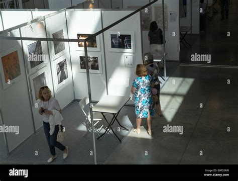 people observing art exhibition Stock Photo - Alamy