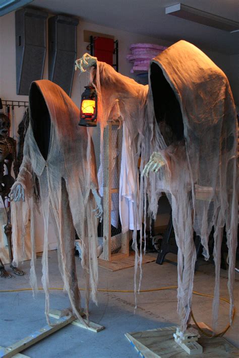 Cloaked Ghosts 1 & 2 | Halloween outdoor decorations, Outdoor halloween, Halloween diy