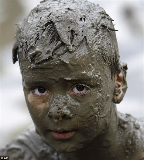 Hitting pay dirt: Hundreds of kids get down and dirty for Michigan's ...