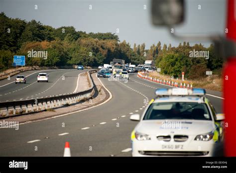 Police Motorway rolling Roadblock Crash RTC Closed Stock Photo - Alamy