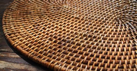 Round Wicker Board on Wooden Surface · Free Stock Photo