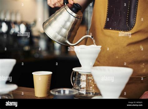 Barista making coffee Stock Photo - Alamy