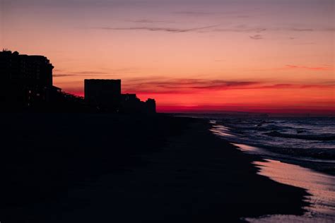 Silhouette of Buildings at Sunset · Free Stock Photo