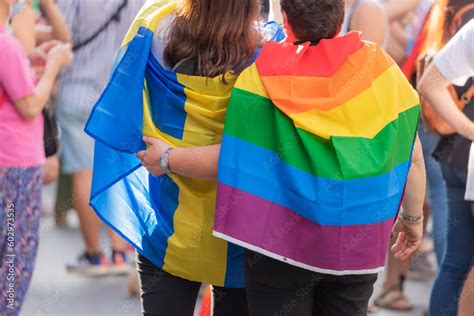 Pride day 2023. People at the pride parade with LGBTIQ flags ...