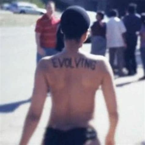 Erykah Badu Tattoos On Her Back