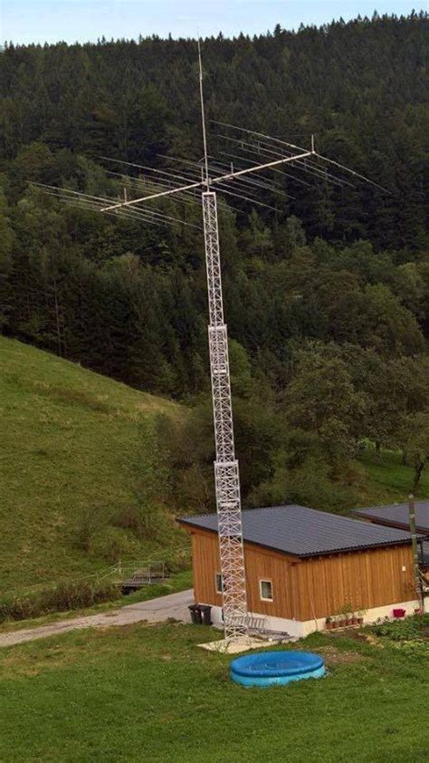 Ham Radio operator hef a big tower + yagi beam and vertical antenna ...