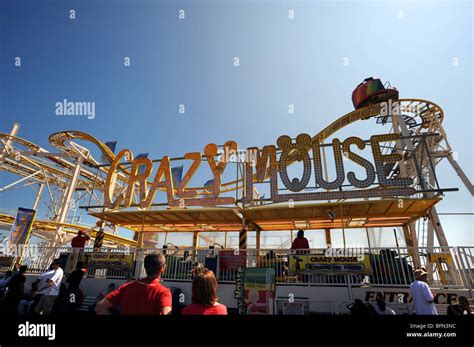 Crazy mouse ride on the end of brighton pier Stock Photo - Alamy