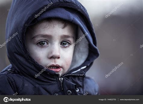 Poor child crying Stock Photo by ©SergeMelkovart 144622753