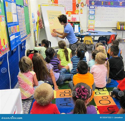 Children Studying in a Kindergarten Classroom with a Teacher Editorial Photography - Image of ...