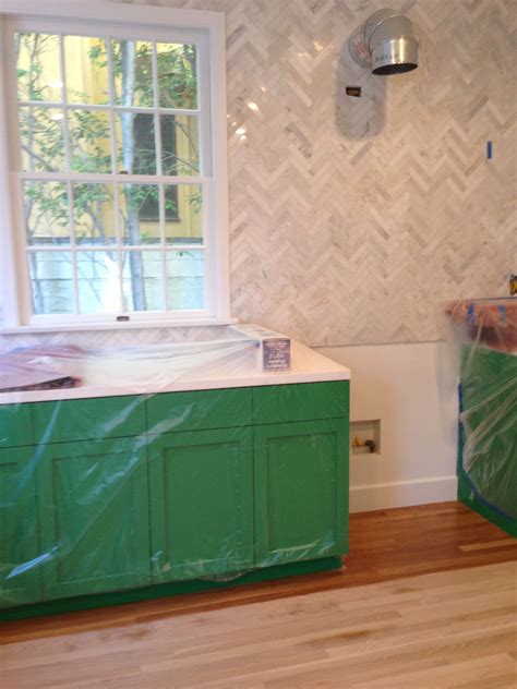 Elegant Kitchen Remodel with Emerald Cupboards