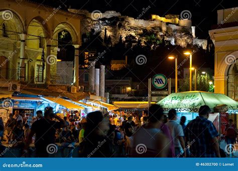 ATHENS-AUGUST 22: Nightlife on Monastiraki Square with Acropolis of Athens on the Background on ...