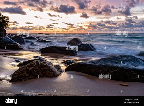 Sunset at beach in Thailand Stock Photo - Alamy