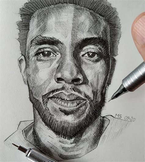 a drawing of a man's face is shown with a pen in his hand