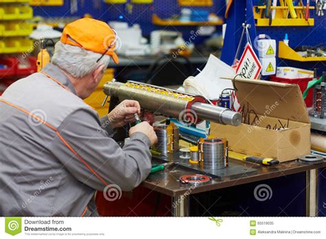 Worker on the factory editorial image. Image of caucasian - 65519035