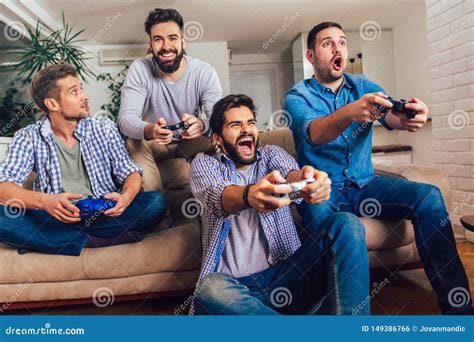 Male Friends Playing Video Games at Home and Having Fun Stock Photo - Image of joystick, leisure ...