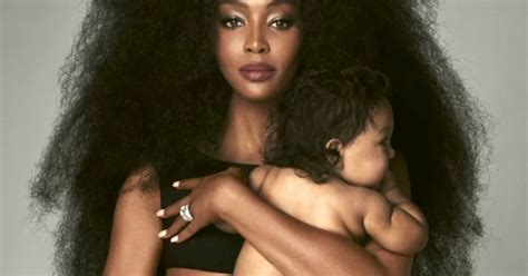 Naomi Campbell holds baby daughter on cover of British Vogue