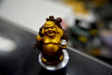 Free Images : statue, buddhism, religion, asia, yellow, toy, sculpture, buddha, holy, oriental ...