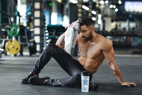 Handsome Athlete Wiping Sweat after Workout at Gym Stock Image - Image of rest, strong: 168433107