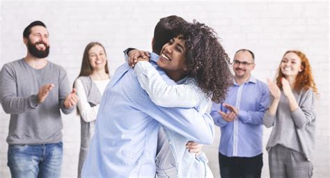 Diverse People Hugging after Successful Workshop or Seminar Stock Image - Image of cooperation ...