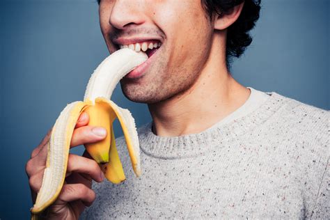 Man Reported to HR Over 'Suggestive' Banana Eating Defended by Internet - Newsweek