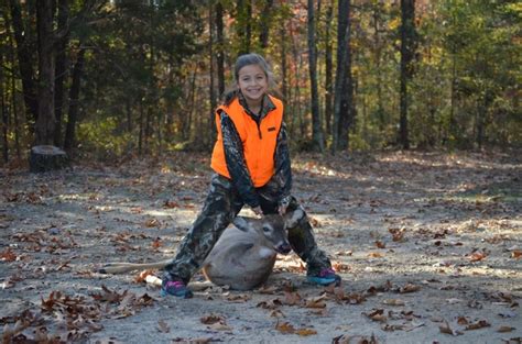 Deer hunting. =)This is my friend Kacilyn and her first buck. :) She's 8 here. Teach your kids ...