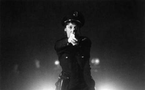 The policeman looks into the camera in The Thin Blue Line (Errol ...