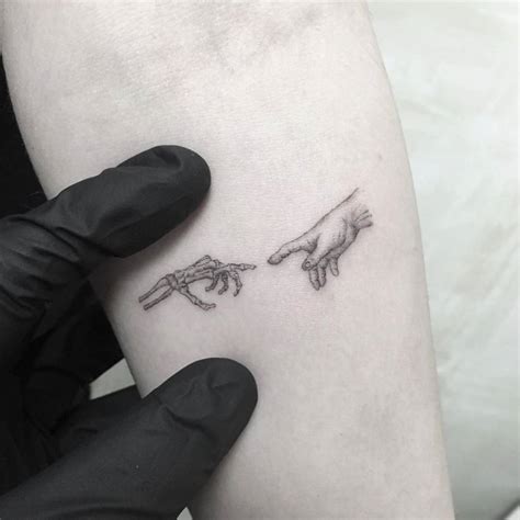 Top 123+ Creation of adam hands tattoo meaning - Monersathe.com