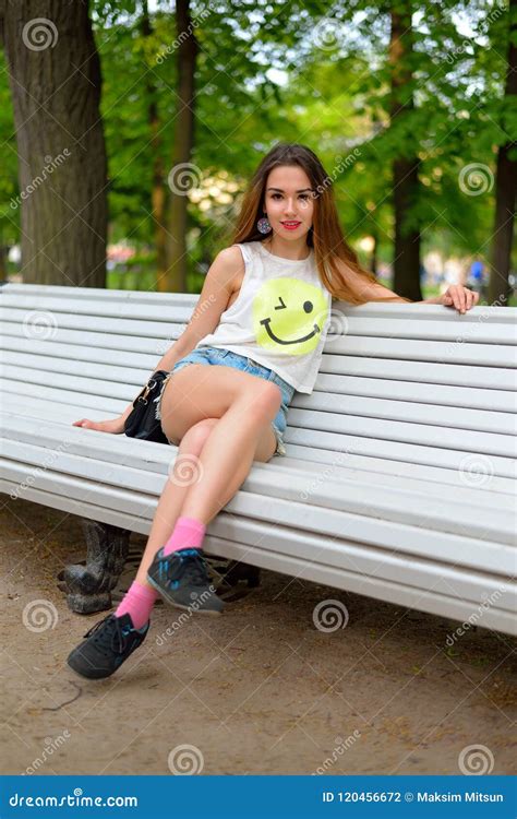 Young Girl Sitting on a Bench in Alexander Park. Stock Photo - Image of young, student: 120456672