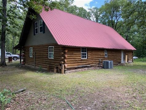 Rustic Log Home Auction — Bryant Auction