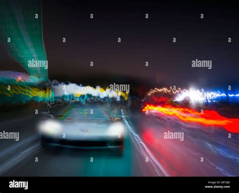 Corvette Car Speeding On Highway At Night Stock Photo - Alamy