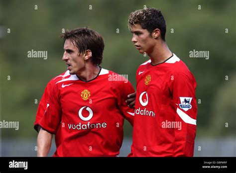 Manchester United's Gary Neville (l) and teammate Cristiano Ronaldo ...