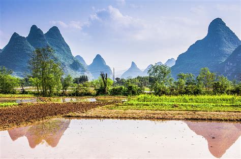 Karst mountains and rural scenery Photograph by Carl Ning | Pixels