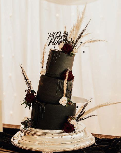 Black Wedding Cake & Decor at Modern Gothic Inspired Wedding