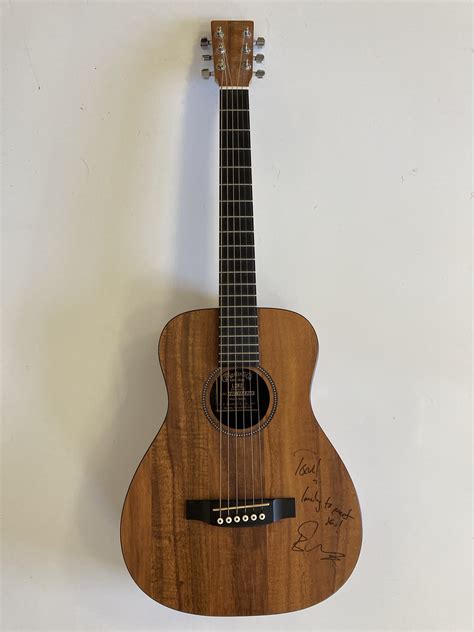 Lot 618 - ED SHEERAN SIGNED AND USED GUITAR.