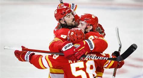 Lindholm, Flames bolster contenders status after historic display