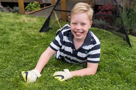 Boy with cerebral palsy - Stock Image - C038/2359 - Science Photo Library