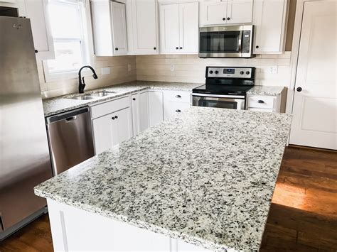 Dallas White (Ashen White) Granite Countertops by: Heartland Granite & Quartz … | White granite ...