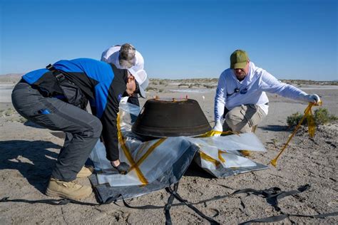 NASA asteroid sample parachutes safely onto Utah desert