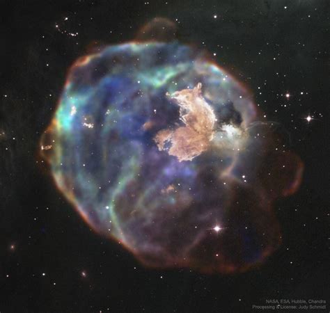 APOD: 2019 December 11 - N63A: Supernova Remnant in Visible and X-ray