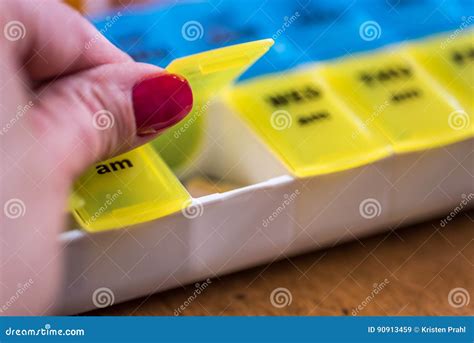 Daily pill reminder box stock image. Image of polish - 90913459