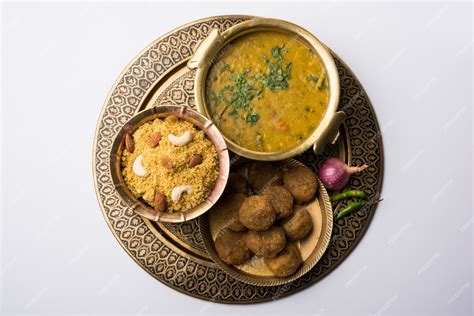 Premium Photo | Daal baati churma is a popular healthy food from rajasthan, india. served in ...