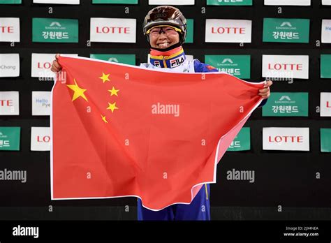 Mengtao Xu of China poses for a photograph after winning the women's ...