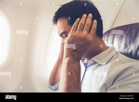 Airplane ear pain hi-res stock photography and images - Alamy