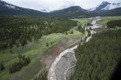 Yellowstone National Park reopens an entrance devastated by June floods : NPR